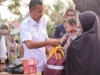 Wujud Kepedulian Pemerintah, Plt. Bupati Boltara Moh Aditya Pontoh Serahkan Bantuan Kepada Korban Kebakaran di Desa Talaga Bintauna